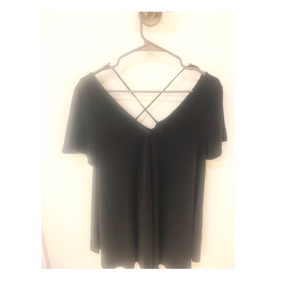 Over size v neck crosses in back